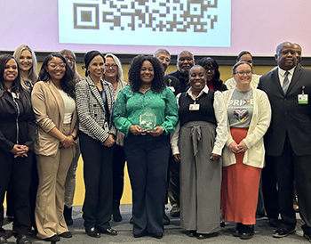 Terra Bautista receives award during WMed MLK Day Celebration