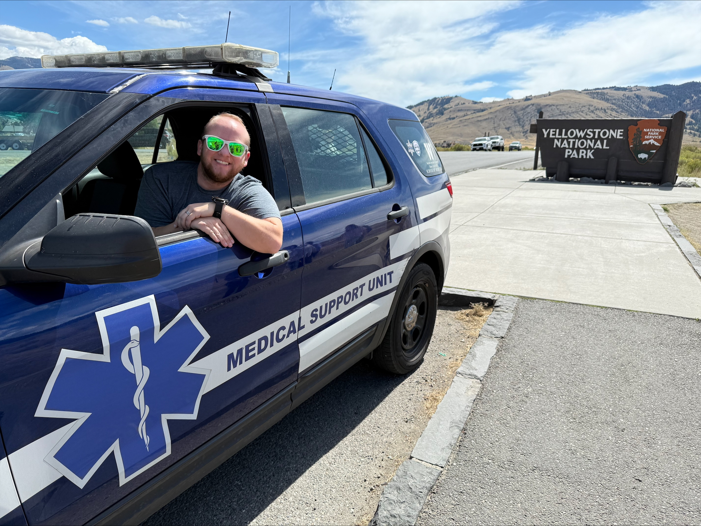 Third-year Emergency Medicine resident Adrian Armel is pictured here during his elective in Yellowstone National Park with the WMed physician response vehicle.