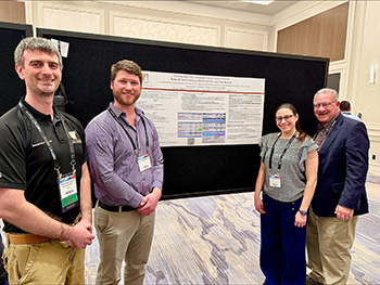 Group photo of Drs. Joshua Mastenbrook, Alex VanWoerkom, Stephanie Van Alsten, and Bill Falesat the National Association of EMS Physicians' Annual Meeting